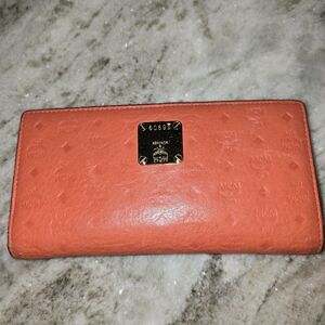 MCM Orange Embossed Leather.Authentic